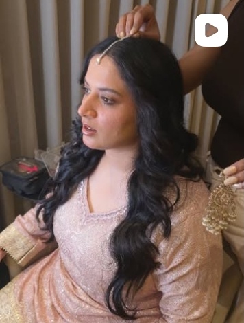 Pastel bridal look with draped curls