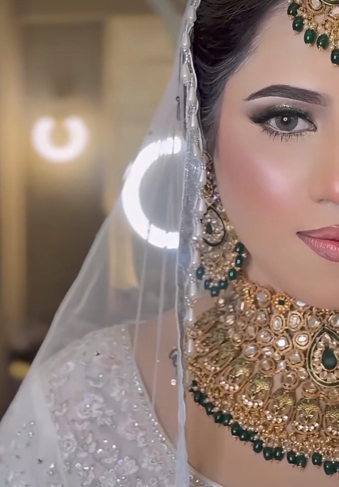 Bridal makeup by Gagz Brar Makeovers — close-up bridal portrait with kundan jewellery